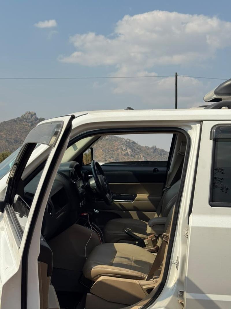 Interior of the Jeep Patriot, showing the front seats, dashboard and controls